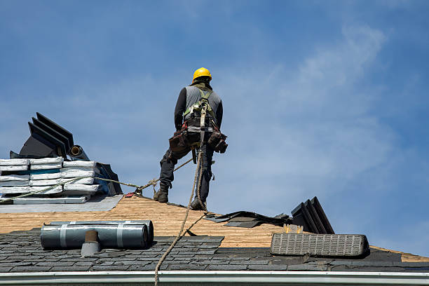 Professional Roofing technician working in Vails Gate, NY